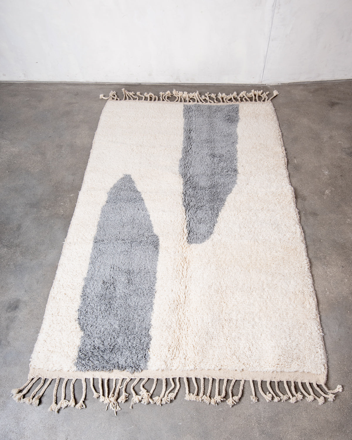 Modern, designer, handcrafted Berber rug from Morocco. Beniourain carpet with beautiful colours and patterns and fluffy wool texture.
